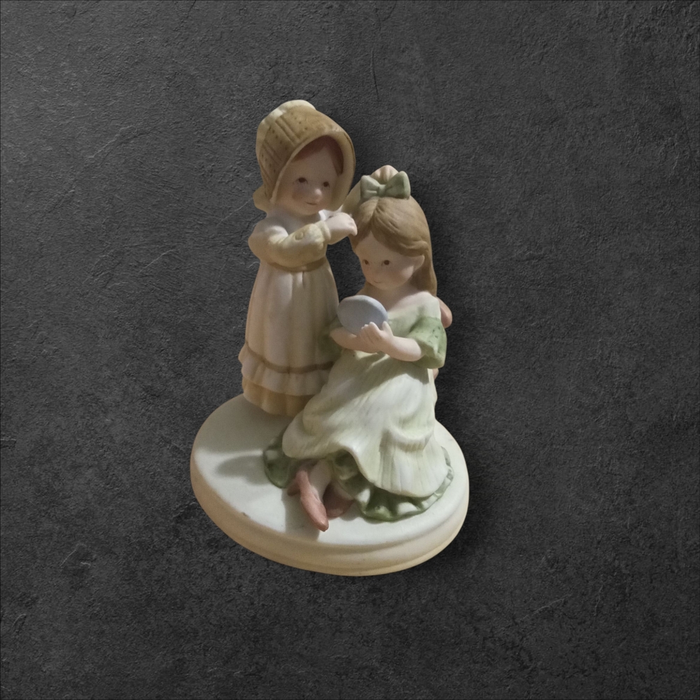 Charming Figurine with Two Girls